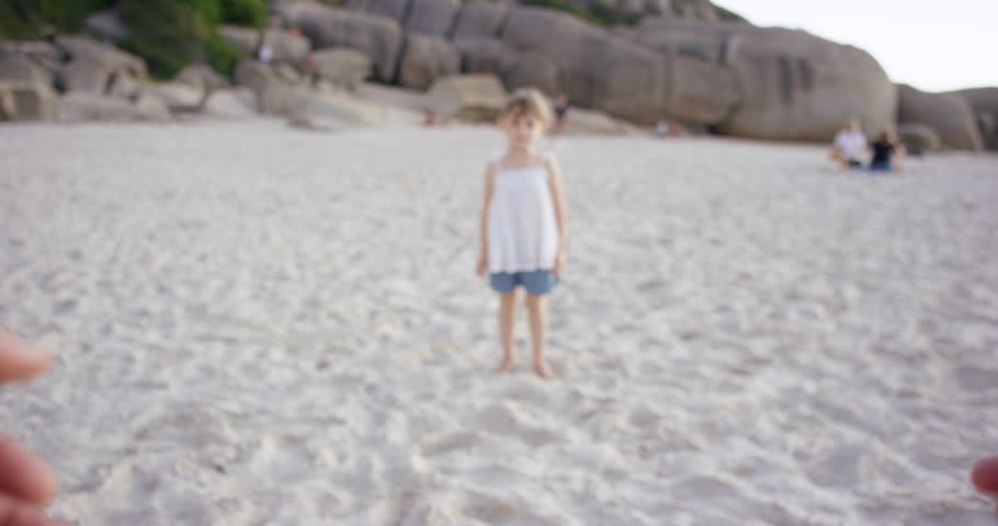 Father Swinging Daughter Around On The Beach At Sunset Having Fun POV