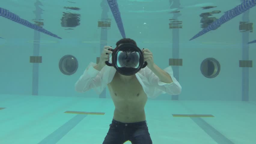 wearing a shirt in the pool