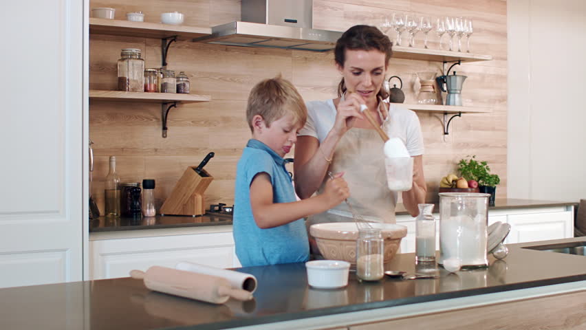 Mom and son in the kitchen Mom and son in the kitchen