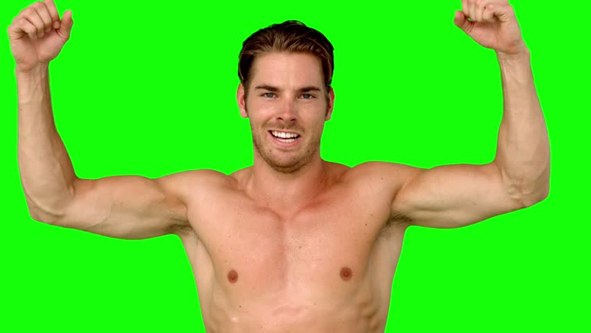 Shirtless Serious Man Flexing Muscles In Slow Motion On 
