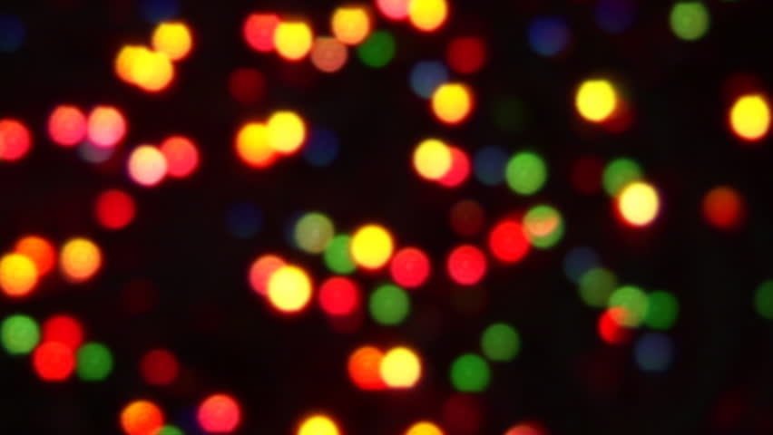 blurred colorful christmas lights on black background with blurred colorful christmas lights on black background with