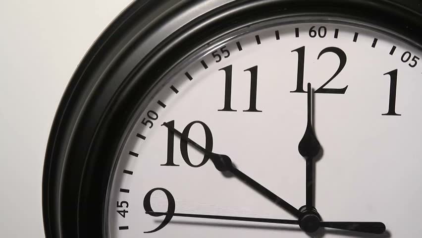 time-lapse-of-a-clock-approaching-12-noon-stock-footage-video-579997