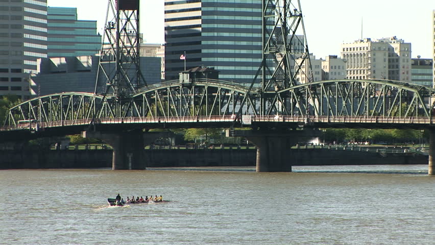 Oarsmen training on the Willamette river in Portland, Oregon. - HD 