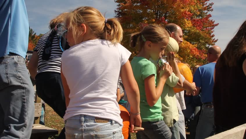 Group Of Young People Hanging Out At Beach Arou