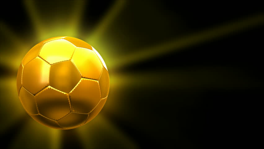 Gold Soccer Ball Rotating On Green Background,seamless LOOP Stock