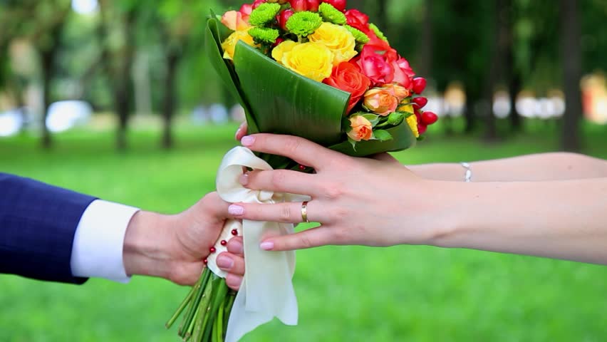 On A Wedding Day Groom Puts A Wedding Ring On Finger Of A Bride. Bride ...