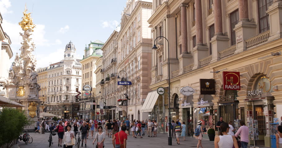 VIENNA, AUSTRIA - JULY 16, 2014 People Walk Rush Hour Shopping Center