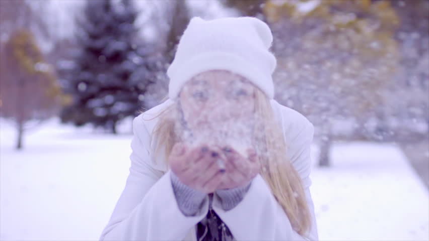 Funny Teen Blows Handful Of Snow At Camera She Gets Snowflakes In Her