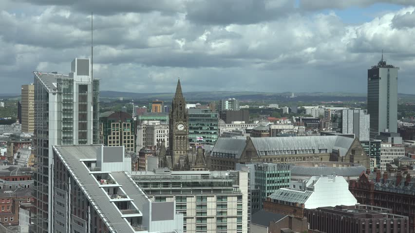 ULTRA HD 4K Timelapse Of Cloud Pass Over Manchester Rooftop Building ...