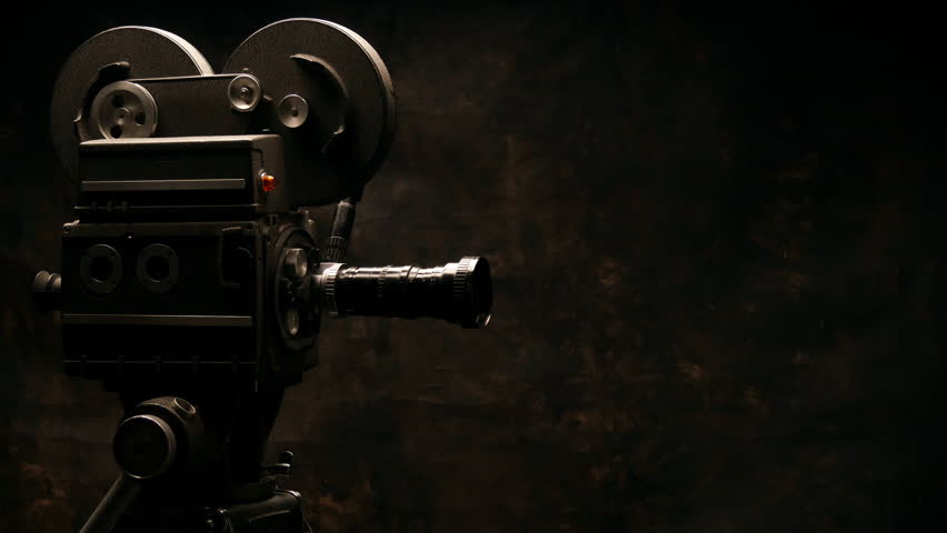 Vintage Hollywood Movie Camera In Front Of Black Backdrop. Suitable For ...