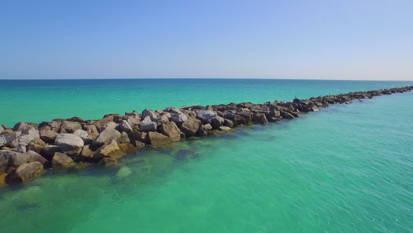 4k Aerial Video Miami Beach Rock Jetty And Pier At South Beach Stock ...