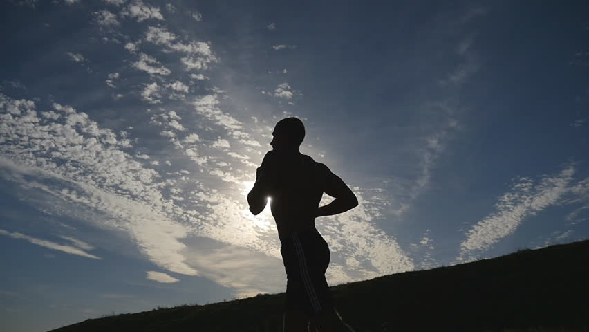 AERIAL: Man Running On The Crater's Edge Of The Volcano Stock Footage ...