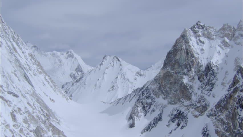 Polar Snow Rocky Mountains Ridges. A High Altitude Look At Converging ...