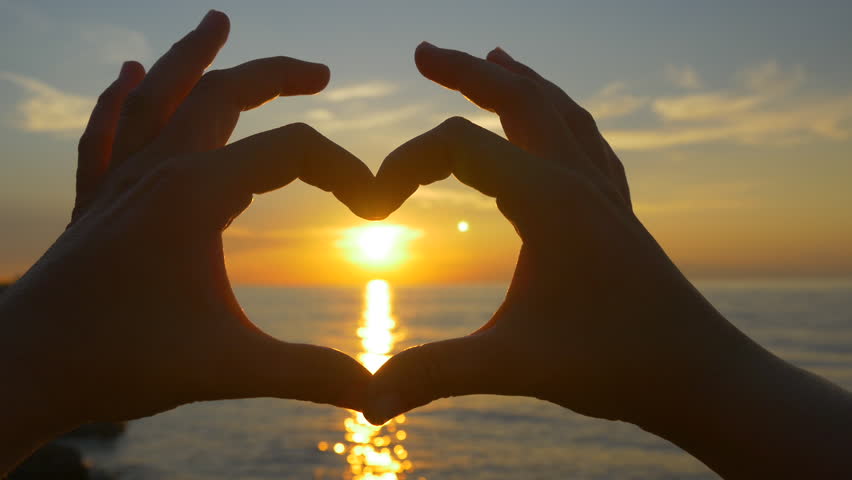 Capturing Ocean Sunset With Heart Shaped Hands Stock Footage Video ...