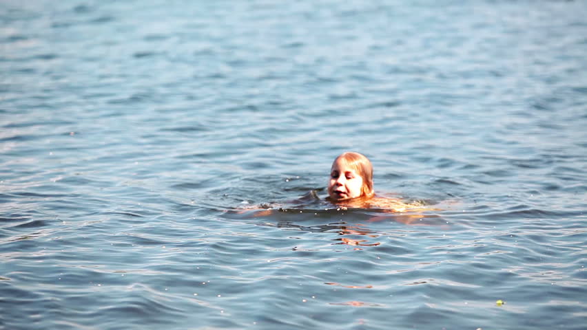 Little Kid Swimming In Water, Go Under Water. Along Child In Lake Stock ...