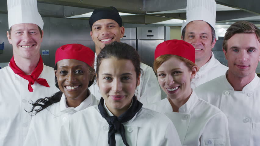 4K Time Lapse Of Busy Team Of Chefs Preparing Food In A Commercial ...