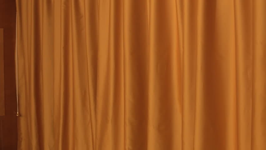 A Static Orange Theater Curtain. Background Or Establishing Shot. Left ...