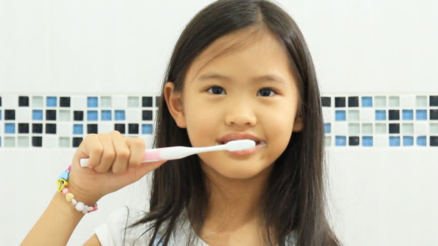 Little Asian Child Brushing Her Teeth Stock Footage Video 6762031 ...